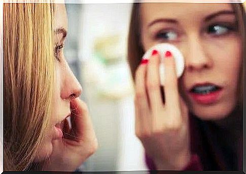 Girl applying eye treatment