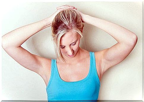 Woman practicing exercises to reduce neck pain