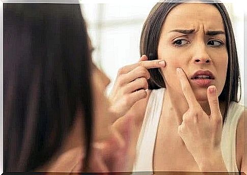 Squeezing pimples on the list of skin care mistakes