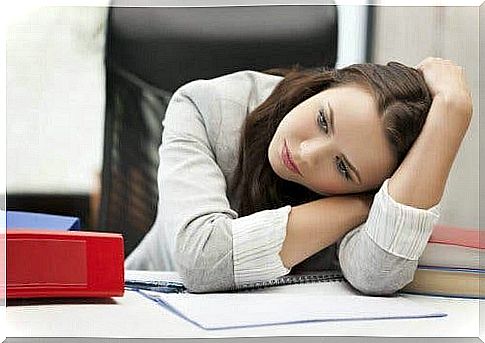 Woman showing hidden symptoms of depression in the office