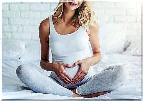 Pregnant woman doing yoga