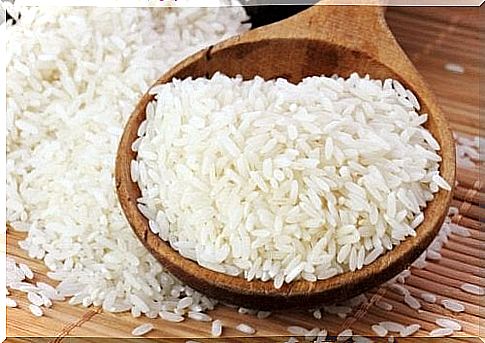 White rice on wooden countertop