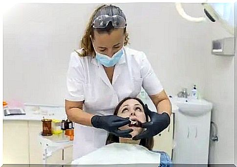 Doctor explaining the benefits of dental bridge